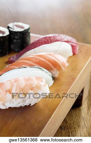 Stock Photo - Close-up of sushi on a table. Fotosearch