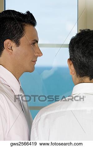 Close-up of two businessmen View Large Photo Image Stock Photo - Close-up of two businessmen. Fotosearch