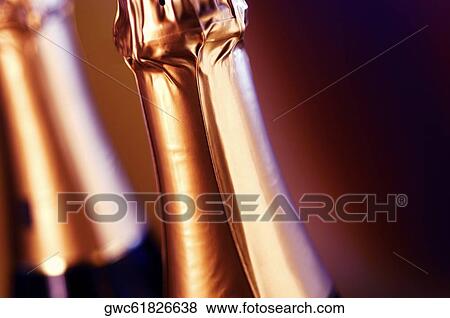 Stock Photo - Close-up of two champagne bottles. Fotosearch