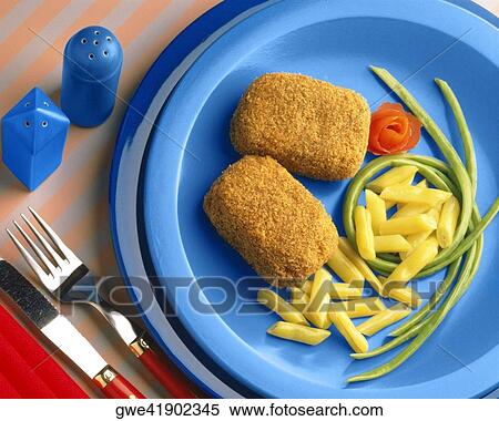 Close-up of two crumb fried pieces in a plate View Large Photo Image Stock Photography - Close-up of two crumb fried pieces in a plate. Fotosearch