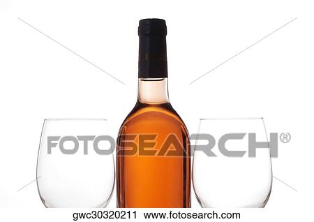 Stock Image - Close-up of two wineglasses with a wine bottle. Fotosearch