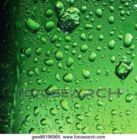 Stock Photography - Close-up of water drops on a glass surface. Fotosearch