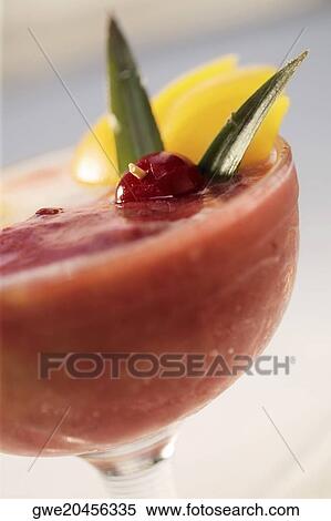 Close-up of watermelon juice in a stem glass View Large Photo Image Stock Photography - Close-up of watermelon juice in a stem glass. Fotosearch