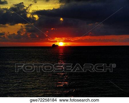 Clouds over the sea at sunset View Large Photo Image Picture - Clouds over the sea at sunset. Fotosearch