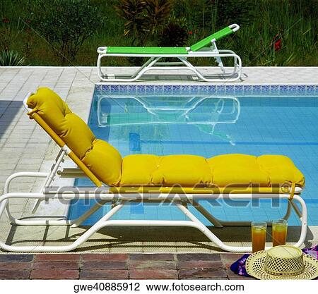 Empty chairs at the poolside View Large Photo Image Stock Image - Empty chairs at the poolside. Fotosearch