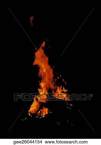 Picture - Flames of a fire at night. Fotosearch