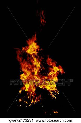 Flames of a fire at night View Large Photo Image Stock Image - Flames of a fire at night. Fotosearch