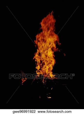 Flames of a fire at night View Large Photo Image Stock Image - Flames of a fire at night. Fotosearch