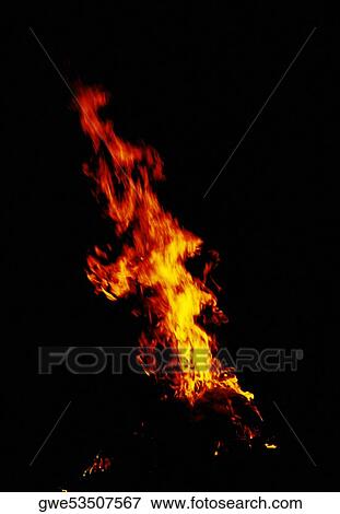 Flames of a fire at night View Large Photo Image Stock Photo - Flames of a fire at night. Fotosearch