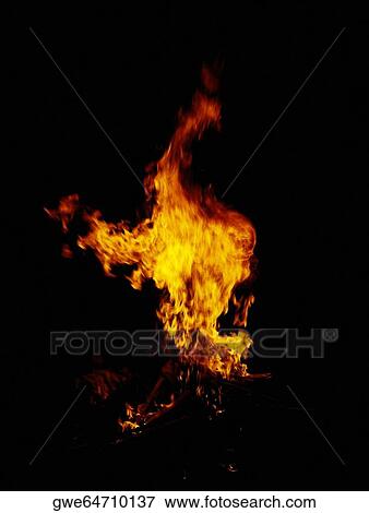 Flames of a fire at night View Large Photo Image Stock Photo - Flames of a fire at night. Fotosearch