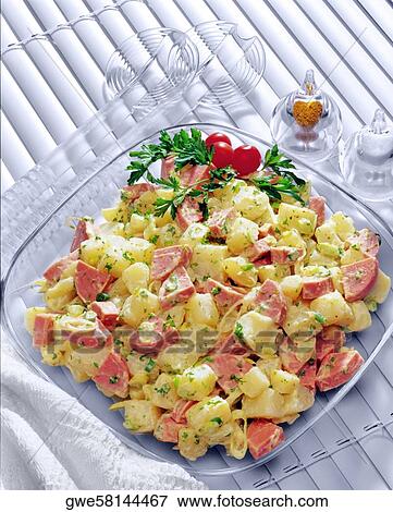 Stock Photo - High angle view of a ham and potato salad. Fotosearch