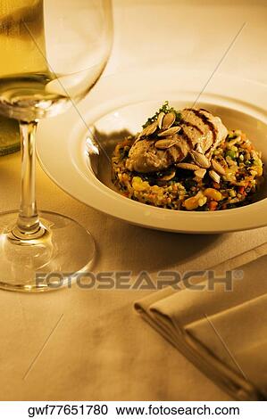 High angle view of a plate of grilled meat on beans View Large Photo Image Stock Image - High angle view of a plate of grilled meat on beans. Fotosearch