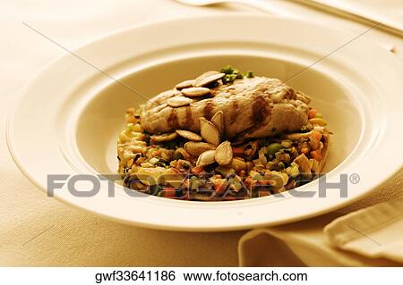 High angle view of a plate of grilled meat on beans View Large Photo Image Stock Photograph - High angle view of a plate of grilled meat on beans. Fotosearch