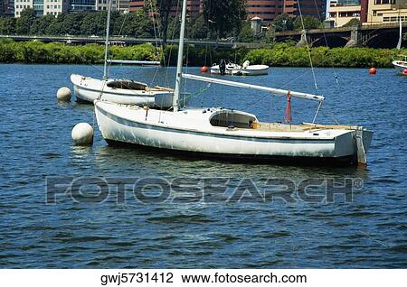 High angle view of a sailboat anchored, Boston, Massachusetts, USA View Large Photo Image Stock Image - High angle view of a sailboat anchored, Boston, Massachusetts, USA. Fotosearch