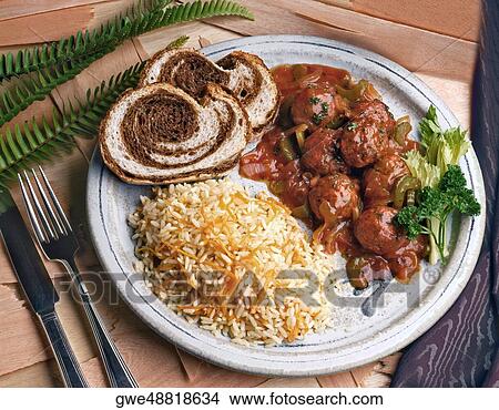 Picture - High angle view of albondigas ensalsa on a plate. Fotosearch