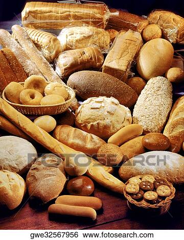 High angle view of assorted breads on a table View Large Photo Image Stock Photograph - High angle view of assorted breads on a table. Fotosearch
