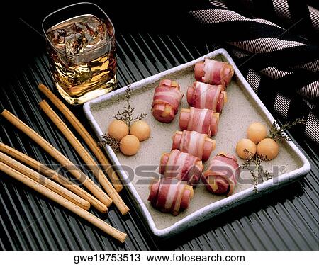 High angle view of bacon on a tray View Large Photo Image Stock Image - High angle view of bacon on a tray. Fotosearch
