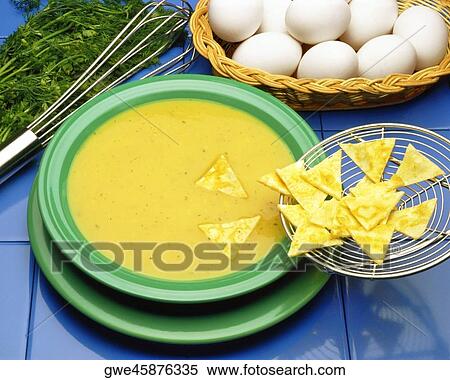 High angle view of bowl of soup with crackers View Large Photo Image Stock Photography - High angle view of bowl of soup with crackers. Fotosearch