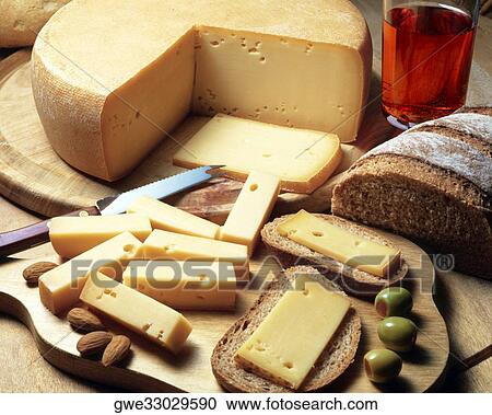High angle view of cheese with bread and olives View Large Photo Image Stock Image - High angle view of cheese with bread and olives. Fotosearch
