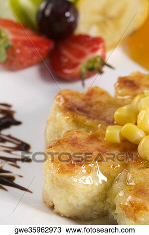 High angle view of corn cakes in a plate View Large Photo Image Stock Image - High angle view of corn cakes in a plate. Fotosearch