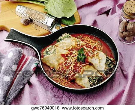 High angle view of crepes in a pan View Large Photo Image Stock Photo - High angle view of crepes in a pan. Fotosearch