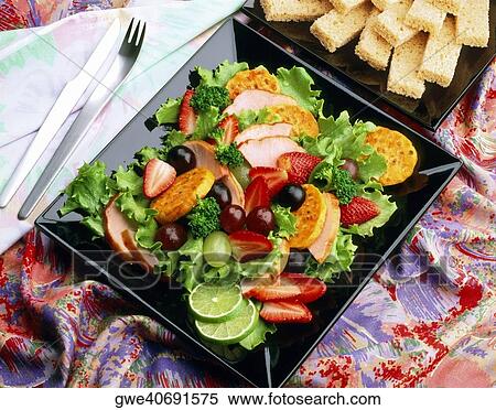High angle view of ensalada con frutas on a plate View Large Photo Image Stock Photography - High angle view of ensalada con frutas on a plate. Fotosearch