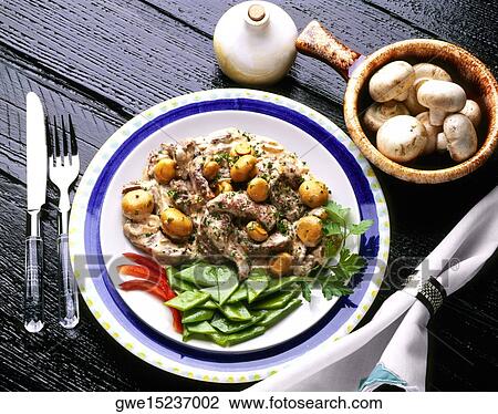 High angle view of fricase de pollo on a plate View Large Photo Image Stock Image - High angle view of fricase de pollo on a plate. Fotosearch