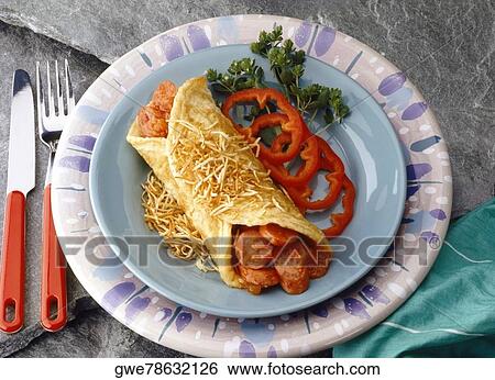 High angle view of omelet ranchero on a plate View Large Photo Image Stock Photograph - High angle view of omelet ranchero on a plate. Fotosearch
