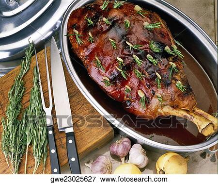 Stock Photo - High angle view of pernil de cerdo in a bowl. Fotosearch