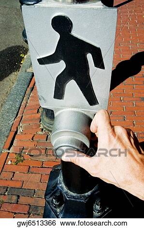 High angle view of person's hand pressing the button of a pedestrian crossing sign, Beacon Street, Boston, Massachusetts, USA View Large Photo Image Stock Photograph - High angle view of person's hand pressing the button of a pedestrian crossing sign, Beacon Street, Boston, Massachusetts, USA. Fotosearch