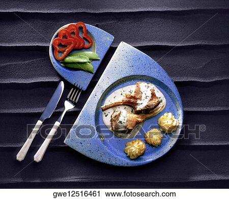 High angle view of pork chops View Large Photo Image Stock Image - High angle view of pork chops. Fotosearch