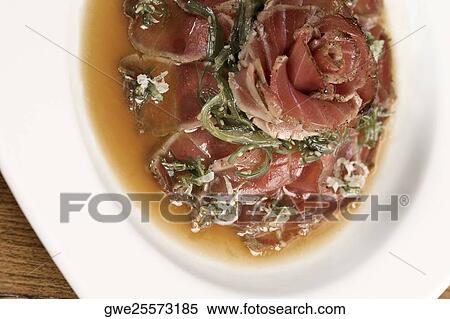 High angle view of prepared pork in a plate View Large Photo Image Stock Photography - High angle view of prepared pork in a plate. Fotosearch