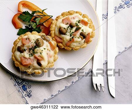 Stock Image - High angle view of quiche jamon on a plate. Fotosearch