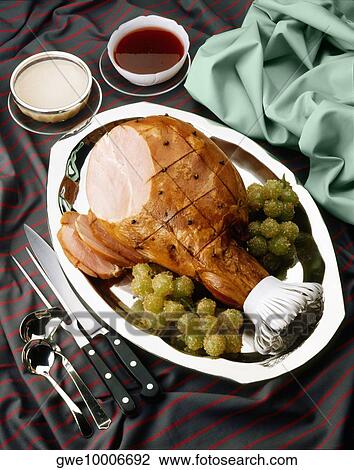 Stock Image - High angle view of served pernil cortado. Fotosearch