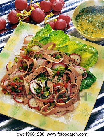 Stock Photo - High angle view of spaghetti in a tray. Fotosearch