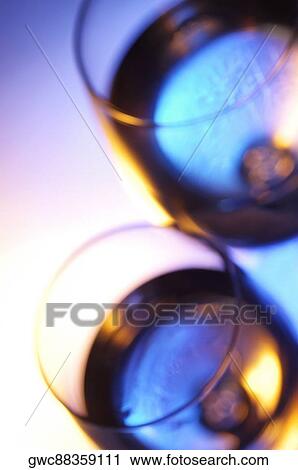Stock Image - High angle view of two glasses of wine. Fotosearch