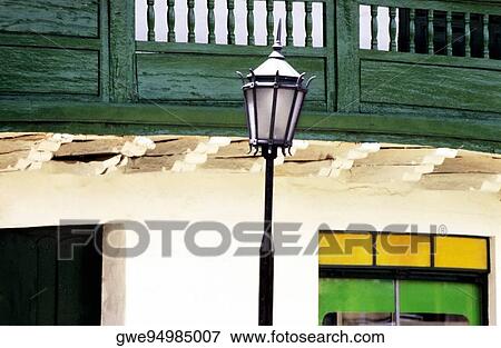 High section view of a lamppost in front of a building View Large Photo Image Stock Photo - High section view of a lamppost in front of a building. Fotosearch