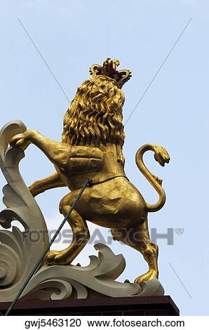 Stock Image - High section view of a statue of a lion, Old State House, Boston, Massachusetts, USA. Fotosearch