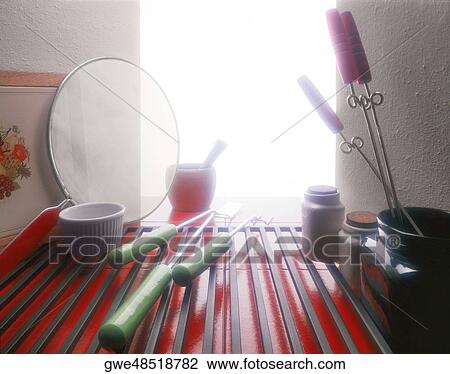 Ladles and a sieve near skewers View Large Photo Image Stock Image - Ladles and a sieve near skewers. Fotosearch