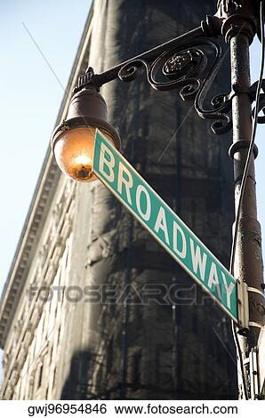 Low angle view of a sign board in front of a building, New York City, New York State, USA View Large Photo Image Stock Photograph - Low angle view of a sign board in front of a building, New York City, New York State, USA. Fotosearch