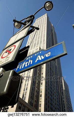 Stock Image - Low angle view of a skyscraper in a city, New York City, New York State, USA. Fotosearch
