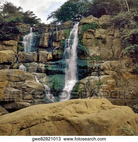 Low angle view of a waterfall View Large Photo Image Stock Image - Low angle view of a waterfall. Fotosearch