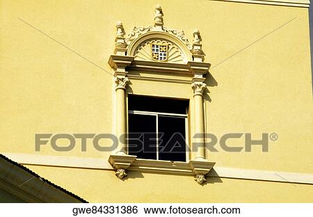 Low angle view of a window on a building View Large Photo Image Stock Photograph - Low angle view of a window on a building. Fotosearch
