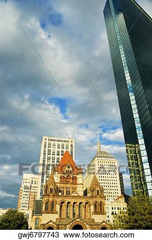 Low angle view of buildings in a city, Trinity Church, John Hancock Tower, Boston, Massachusetts, USA View Large Photo Image Stock Image - Low angle view of buildings in a city, Trinity Church, John Hancock Tower, Boston, Massachusetts, USA. Fotosearch