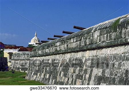 Low angle view of cannons on a stone wall View Large Photo Image Stock Image - Low angle view of cannons on a stone wall. Fotosearch