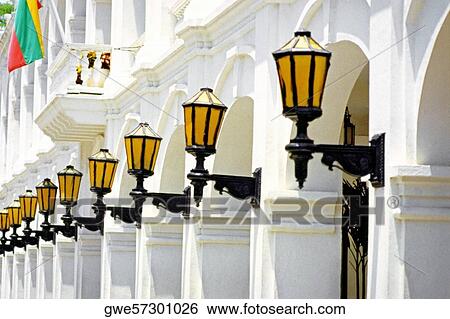 Low angle view of lanterns on the wall of a building View Large Photo Image Stock Photograph - Low angle view of lanterns on the wall of a building. Fotosearch
