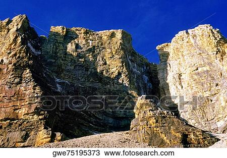 Low angle view of rock formations View Large Photo Image Stock Image - Low angle view of rock formations. Fotosearch