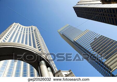 Low angle view of skyscrapers in a city, New York City, New York State, USA View Large Photo Image Stock Image - Low angle view of skyscrapers in a city, New York City, New York State, USA. Fotosearch