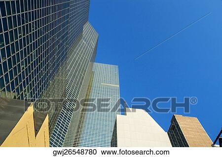 Low angle view of skyscrapers in a city, New York City, New York State, USA View Large Photo Image Stock Image - Low angle view of skyscrapers in a city, New York City, New York State, USA. Fotosearch