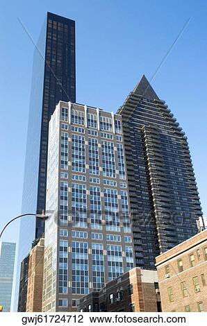 Low angle view of skyscrapers in a city, New York City, New York State, USA View Large Photo Image Stock Image - Low angle view of skyscrapers in a city, New York City, New York State, USA. Fotosearch